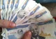 Banknoty tajskich bahtów o różnych nominałach