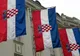 Chorwackie flagi na fasadzie hotelu Esplanade w Zagrzebiu