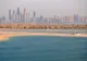 Panorama wieżowców Dubai Marina widziana znad domów na Palm Jumeirah