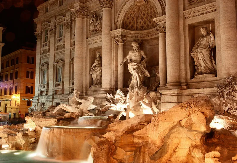 Barokowa Fontanna di Trevi z posągiem Neptuna w Rzymie
