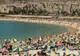 Zatłoczona plaża Playa Amadores
