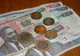 Starsze banknoty i monety kenijskie z portretem Jomo Kenyatty