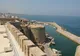 Mury i baszty zamku w Kyrenii (Girne) nad portem na północnym wybrzeżu Cypru
