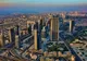 Wieżowce Dubaju wzdłuż Sheikh Zayed Road widziane z lotu ptaka o zachodzie słońca