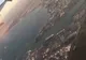 Port Radès-La Goulette pod Tunisem widziany z okna samolotu: nabrzeża, statek i zabudowa miasta